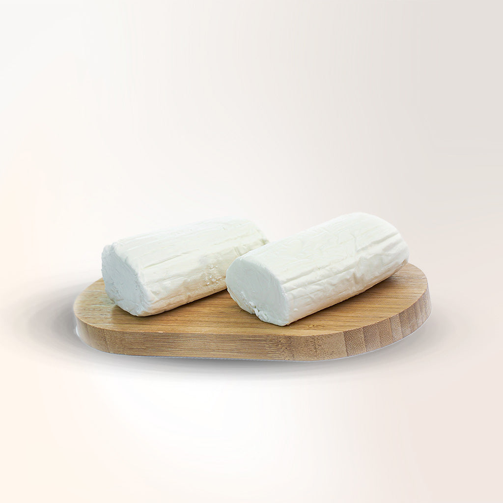 zebdeya karish cheese on a wood platter