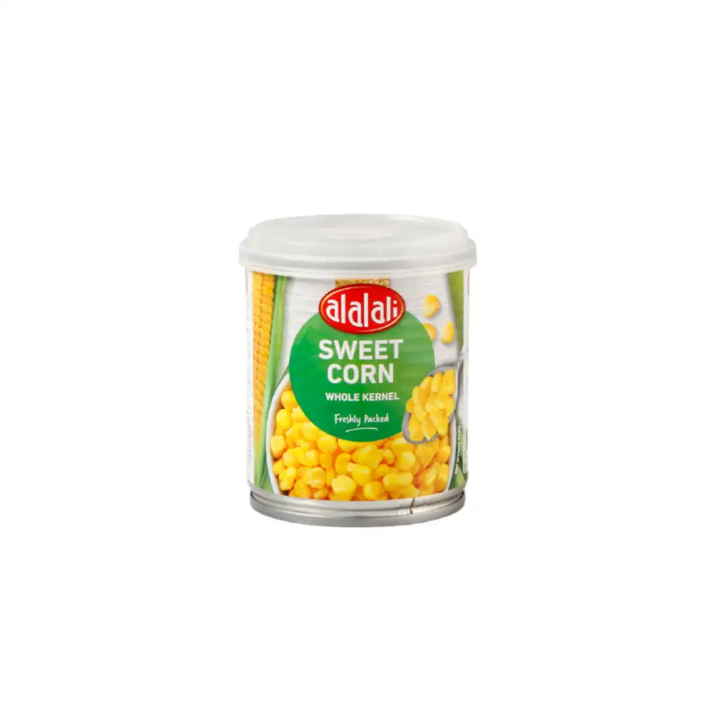 Can of Al Alali Whole Kernel Corn with vibrant yellow corn kernels shown on a spoon