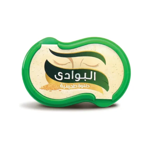 Sliced Halawa Al Bawady sesame sweet on a plate showing its smooth, dense texture